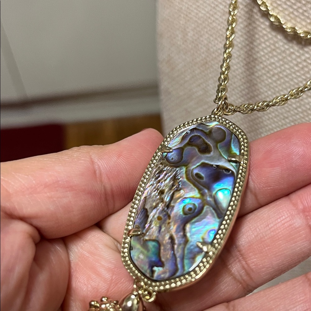 Kendra Scott Gold Layered Necklace with Iridescent Abalone Pendant and Tassel - Picture 8 of 9